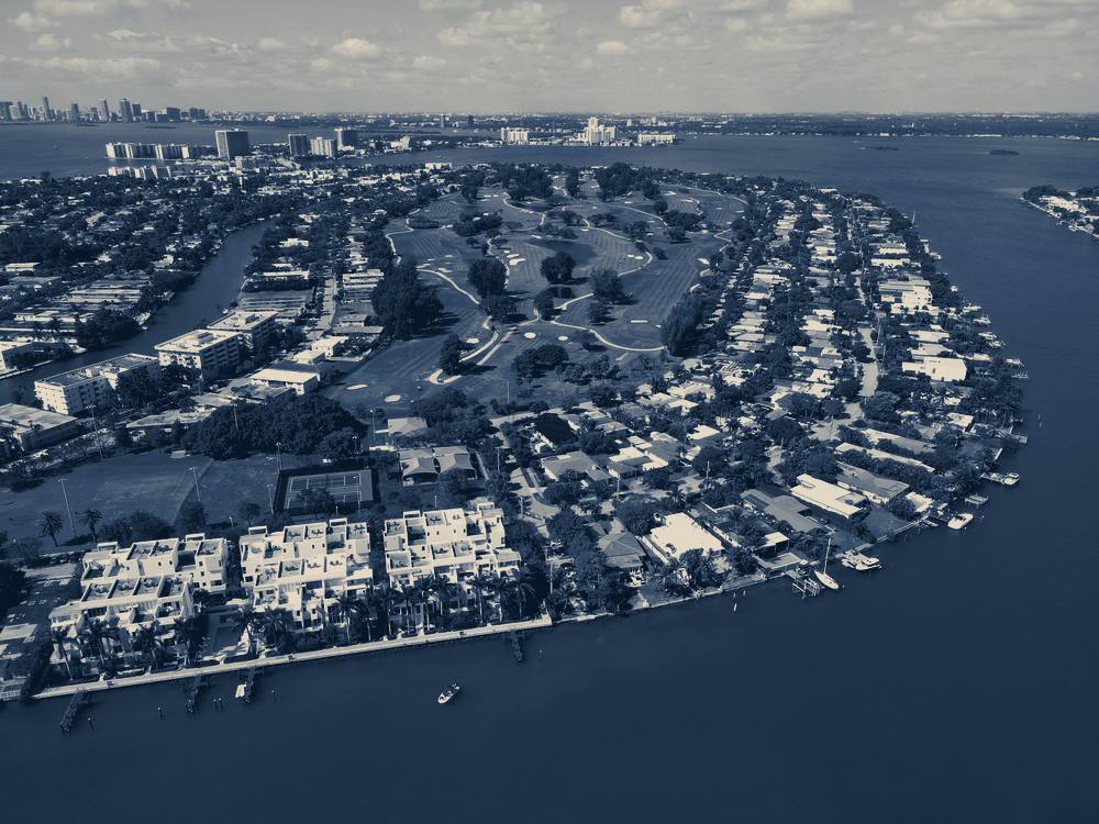 Aerial view of waterfront homes and a golf course, Miami Beach, Florida