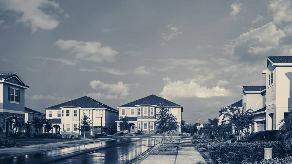 Houses along a street under a blue sky, Orlando, Florida