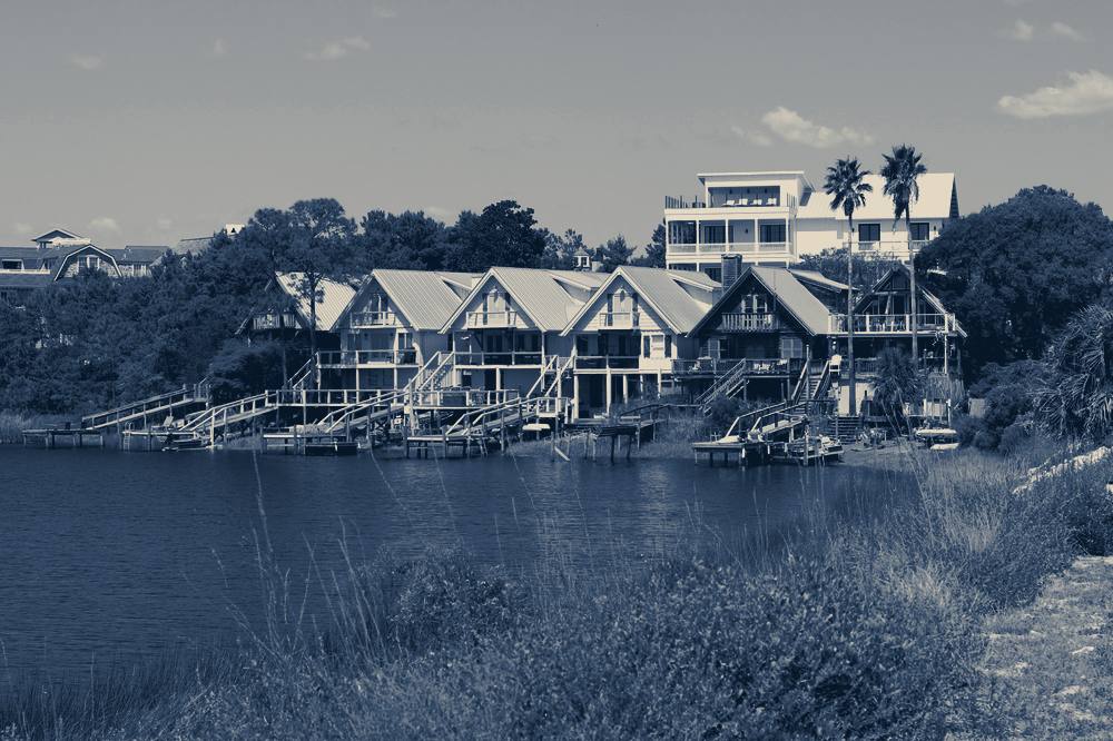 Waterfront houses with wooden docks, Rosemary Beach, Florida