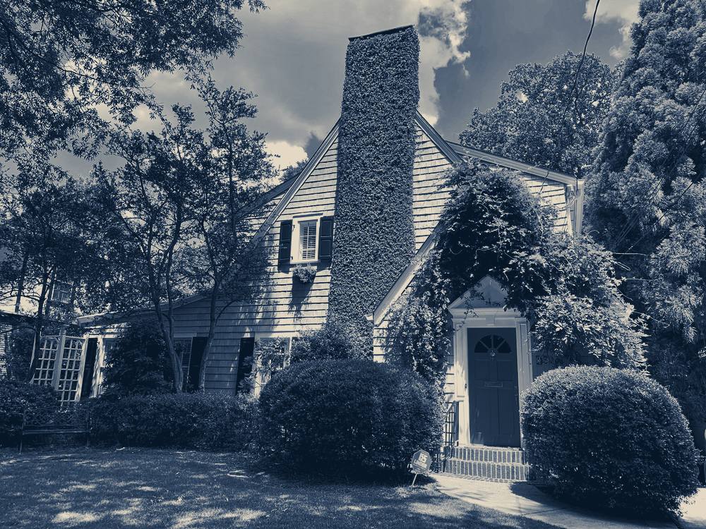 A white wooden house with a red door, Atlanta, Georgia