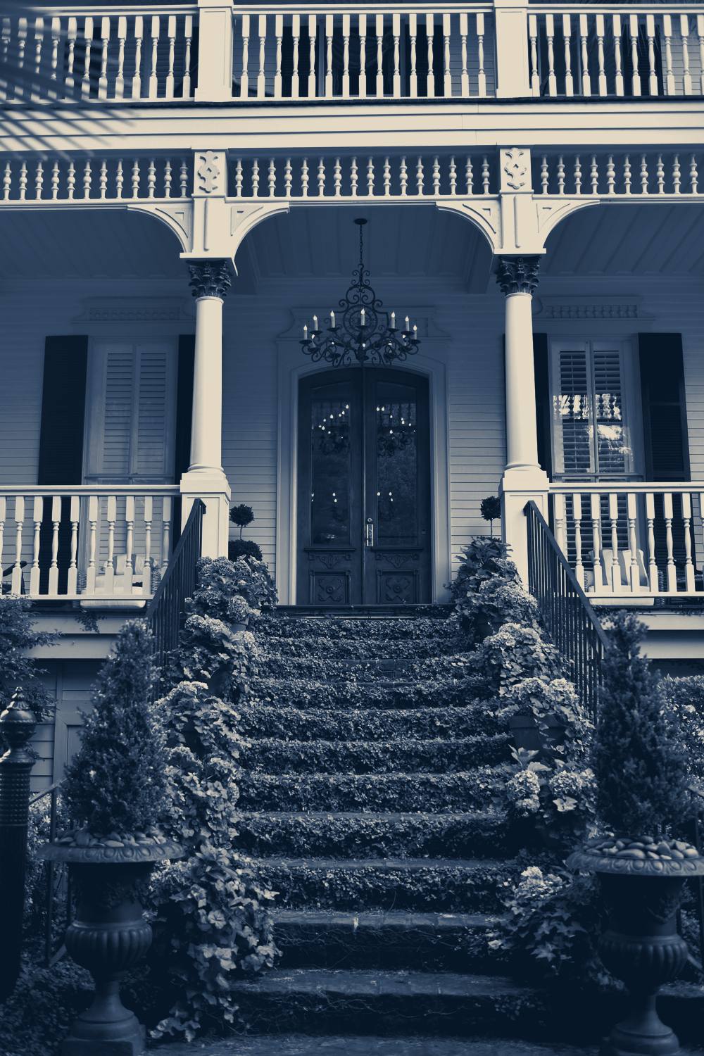 A white house with flowers on the steps, Savannah, Georgia